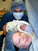 In the operating room, C-section. Talina Bytheway and Jeron Dotson with their new son Sean Everett Dotson